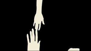 White hands reaching out to touch each other against a black background