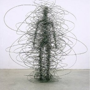 Gray stick figure of a human with gray wires spinning around