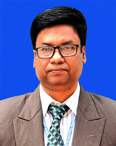 Poet Mahbub, a South Asian man with dark hair and glasses and a suit and tie