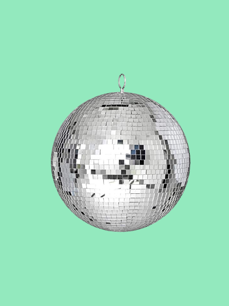 Silver disco ball against a light green background