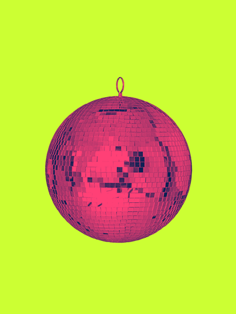 Shiny magenta disco ball against a bright light green background