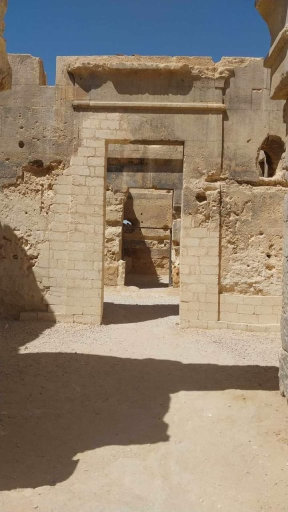 Stone ruins of a doorway in a historic building 