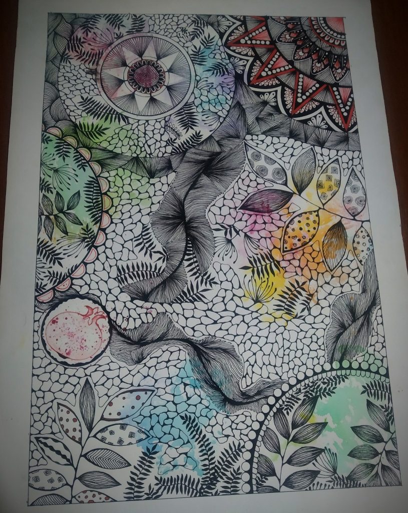 Intricate pattern designs with triangles and veined leaves, some red, green, and yellow. 