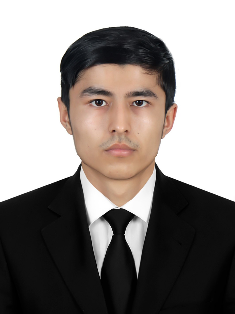 Central Asian boy with short hair and a black suit and tie. 